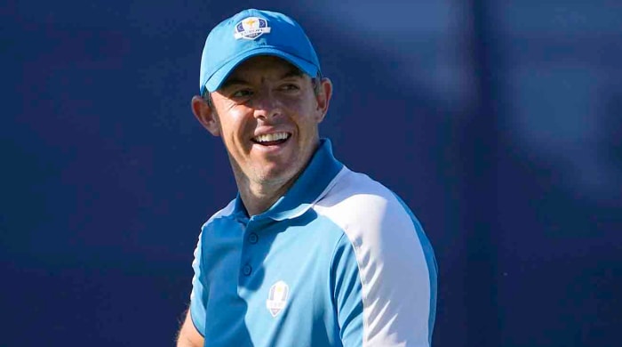Team Europe golfer Rory McIlroy reacts to the video screen on the 6th hole during Day 1 at the 2023 Ryder Cup at Marco Simone Golf and Country Club.